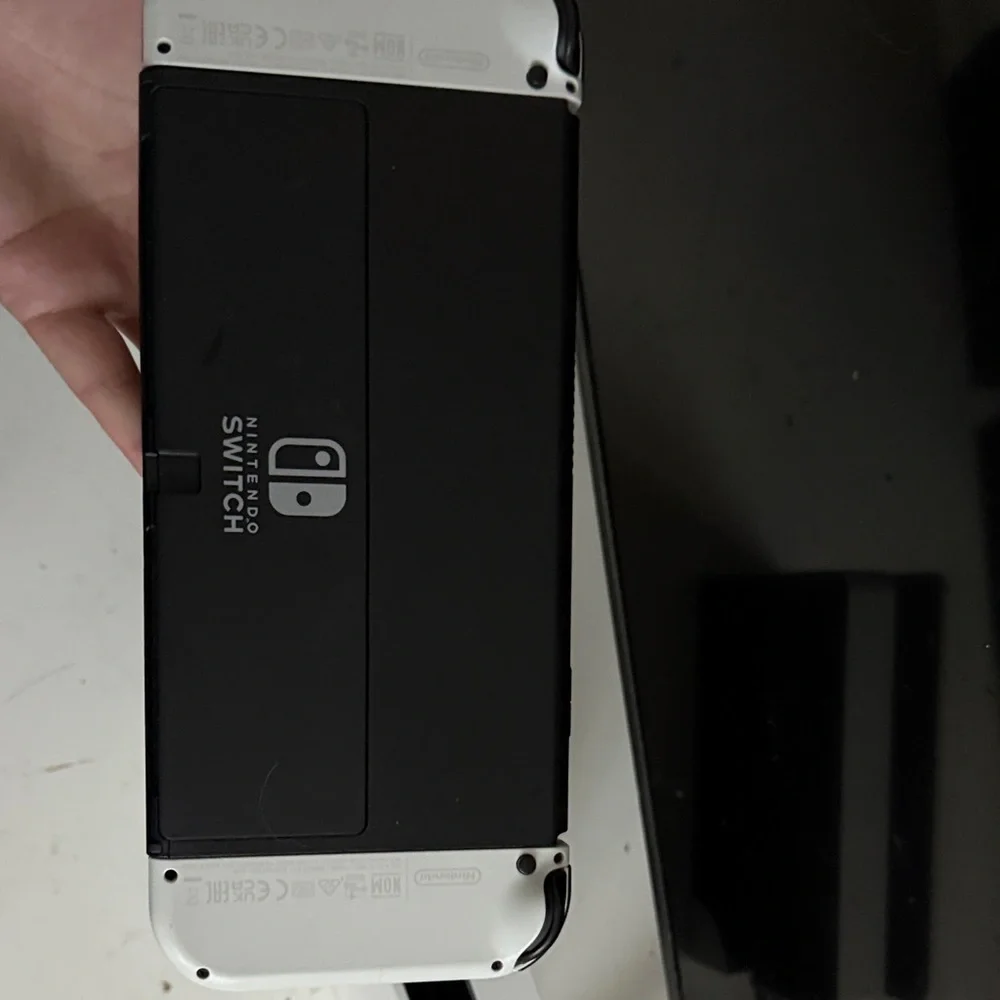 Nintendo Switch OLED White Handheld Gaming Console with Dual Analog Controls